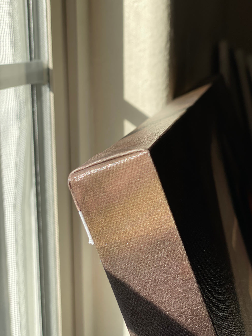 The folded canvas corners.