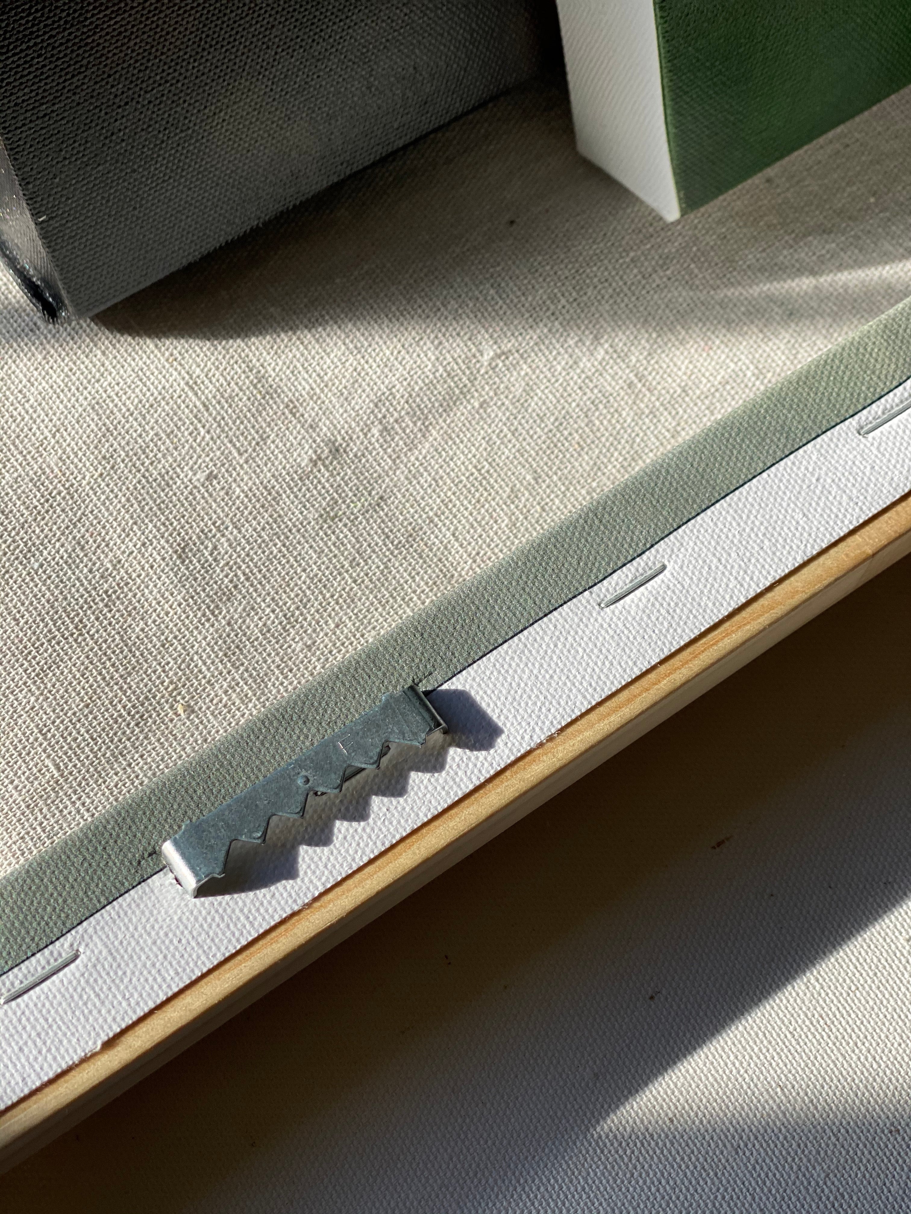 Hardware that comes with each canvas so it's ready to hang.